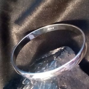 Monet bangle bracelet 2.5 across silver tone. Designer bangle bracelet